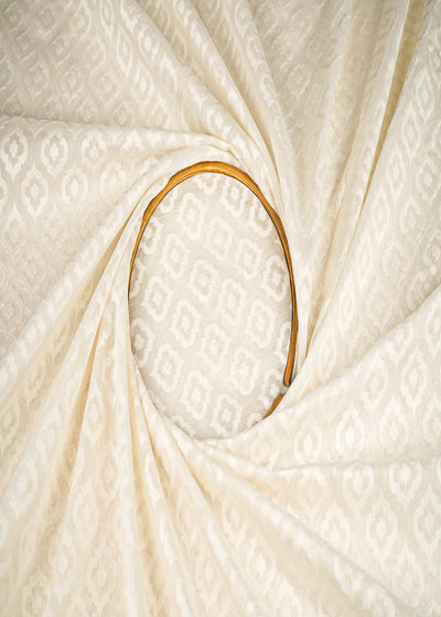 Off White Dyeable Chanderi Fabric With All Over Self Work 22972