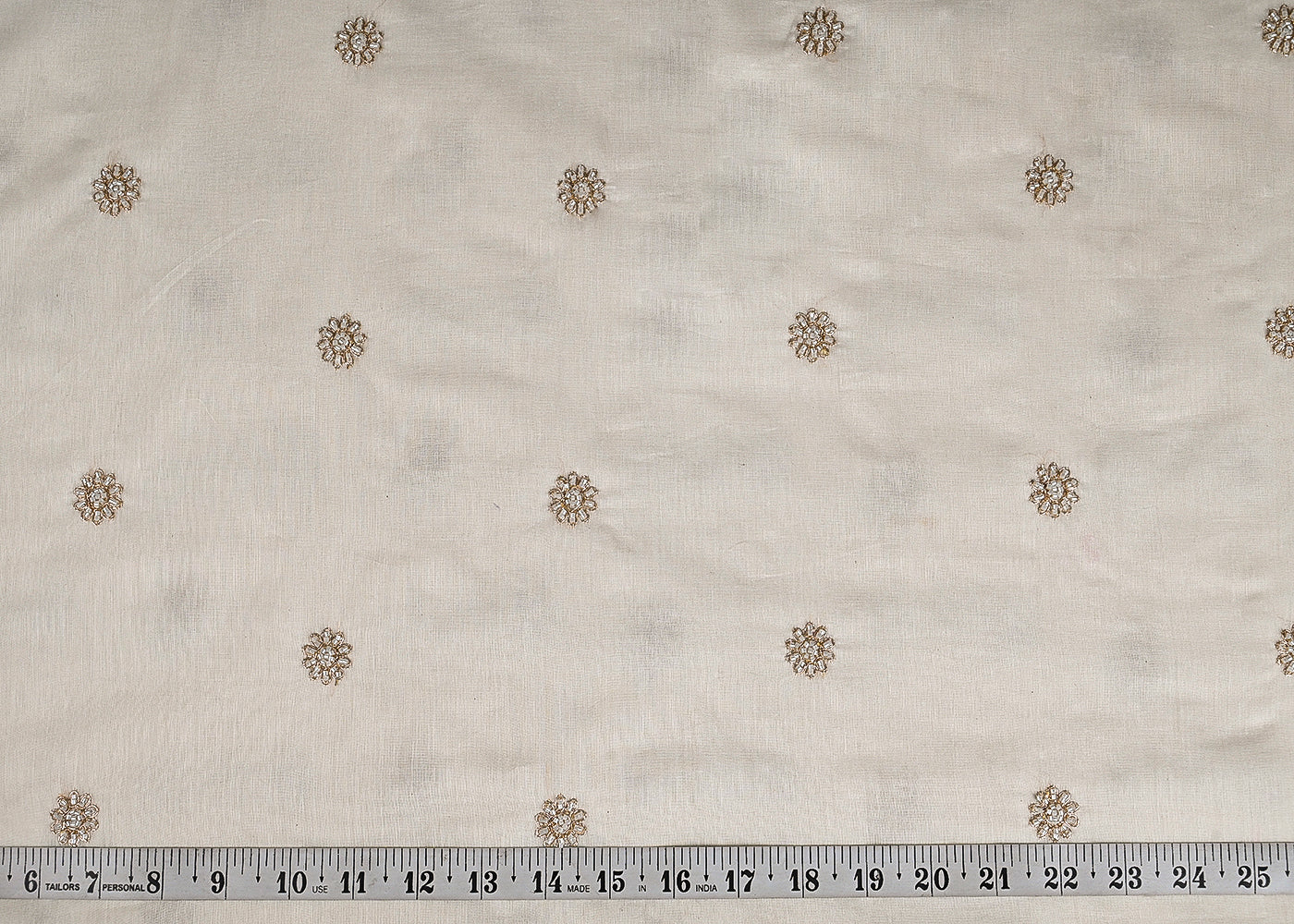 White Dyeable Chanderi Fabric With All Over Zari And Bead Work 23127