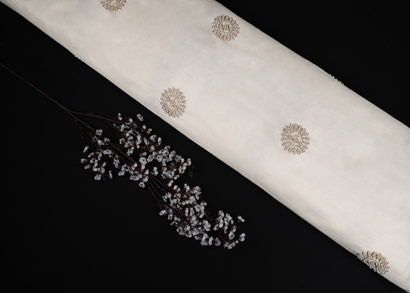 White Dyeable Chanderi Fabric With All Over Zari And Bead Work 23128