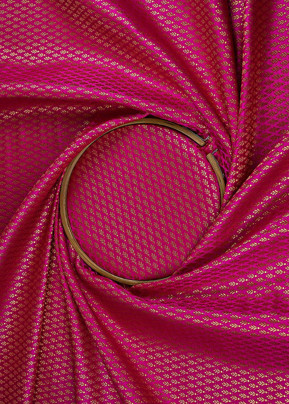 rani-pink-banarasi-brocade-fabric-with-all-over-golden-zari-handloom-23165-close-view