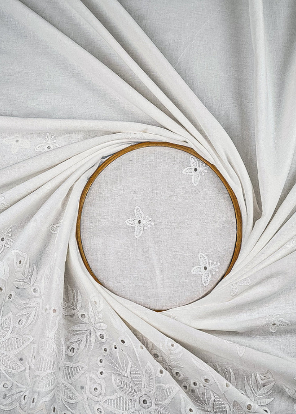 White Mul Cotton Fabric With All Over Thread And Cutwork With Border 23355