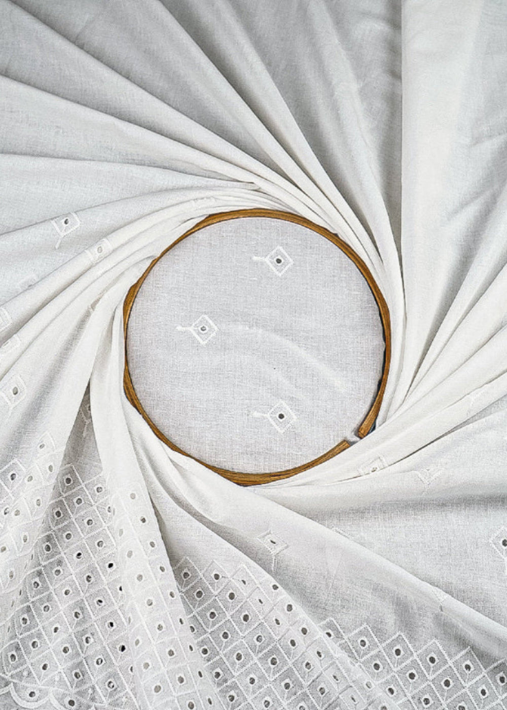 White Mul Cotton Fabric With All Over Thread And Cutwork With Border 23356