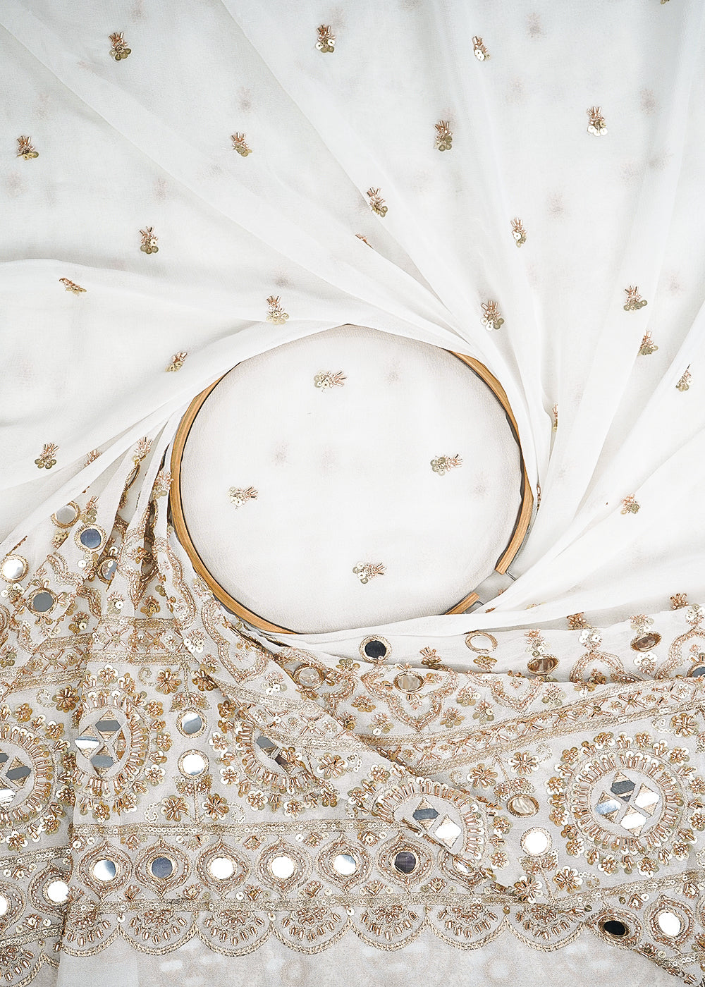 White Dyeable Georgette Fabric With All Over Sequins, Katdana, Zari And Faux Mirror Work With One Side Heavy Border 23671