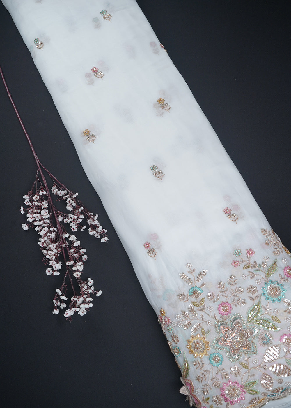 White Dyeable Georgette Fabric With All Over Sequins, Katdana, Zari, Thread, Bead And 3D Work With One Side Heavy Border 23692