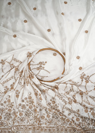 White Dyeable Crepe Fabric With All Over Zari, Sequins And Katdana Work With One Side Heavy Border 23932