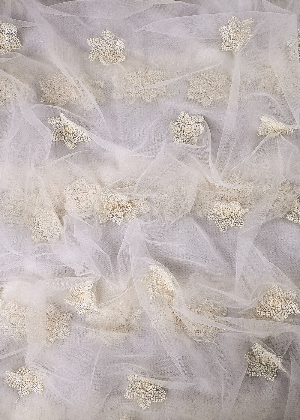 White Dyeable Net Fabric With All Over Buti Of Sequins And Katdana Work 24302