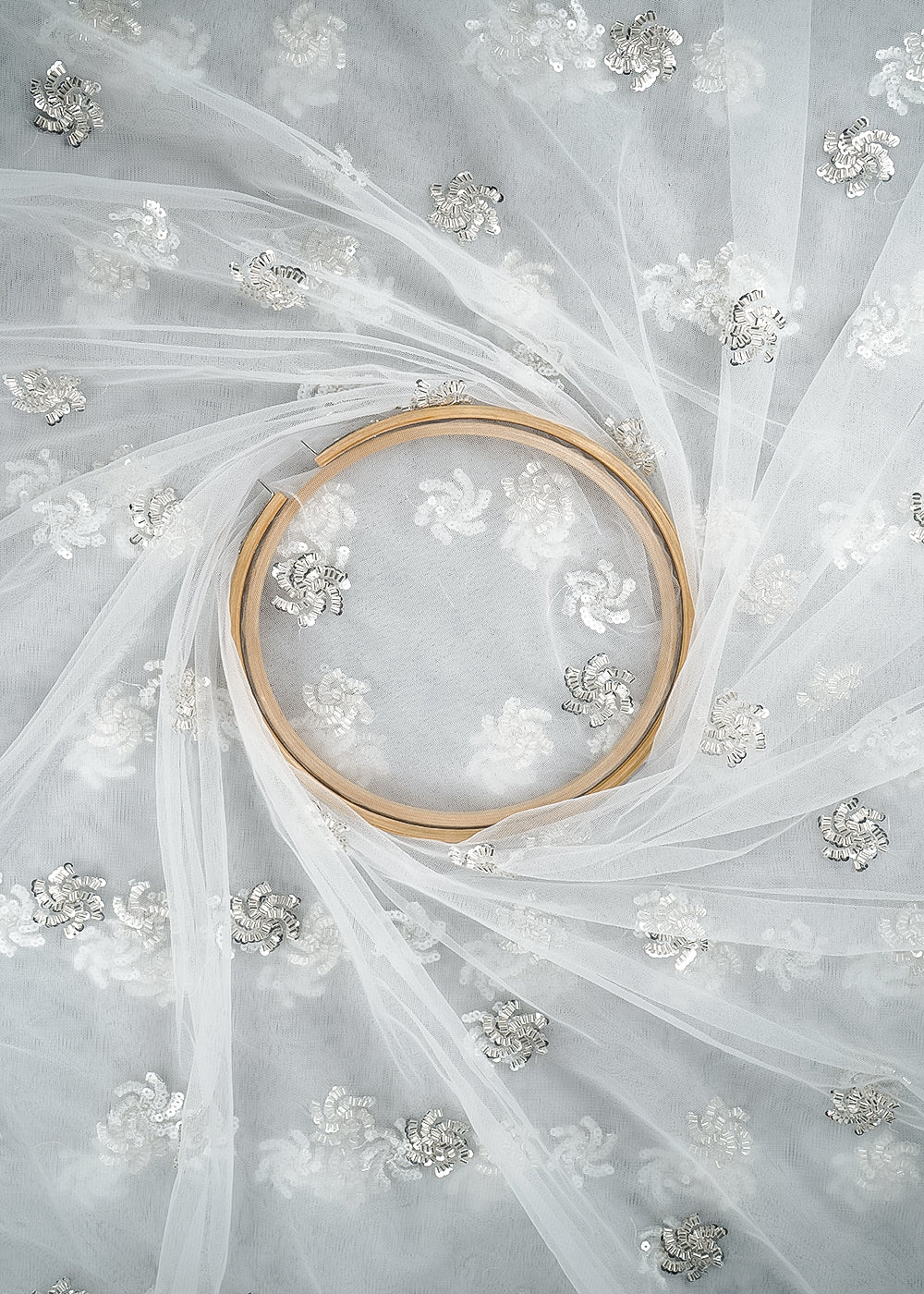 White Dyeable Net Fabric With All Over Buti Of Sequins And Katdana Work 24306