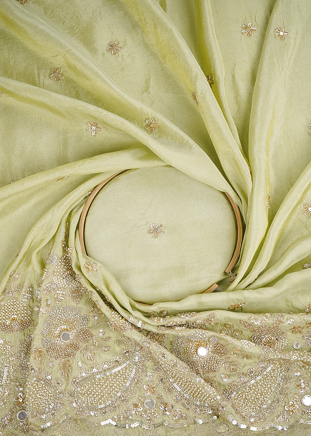 Pista Green Tissue Fabric With All Over Zari, Sequins, Katdana, Bead And Faux Mirror Work With One Side Heavy Border 24546