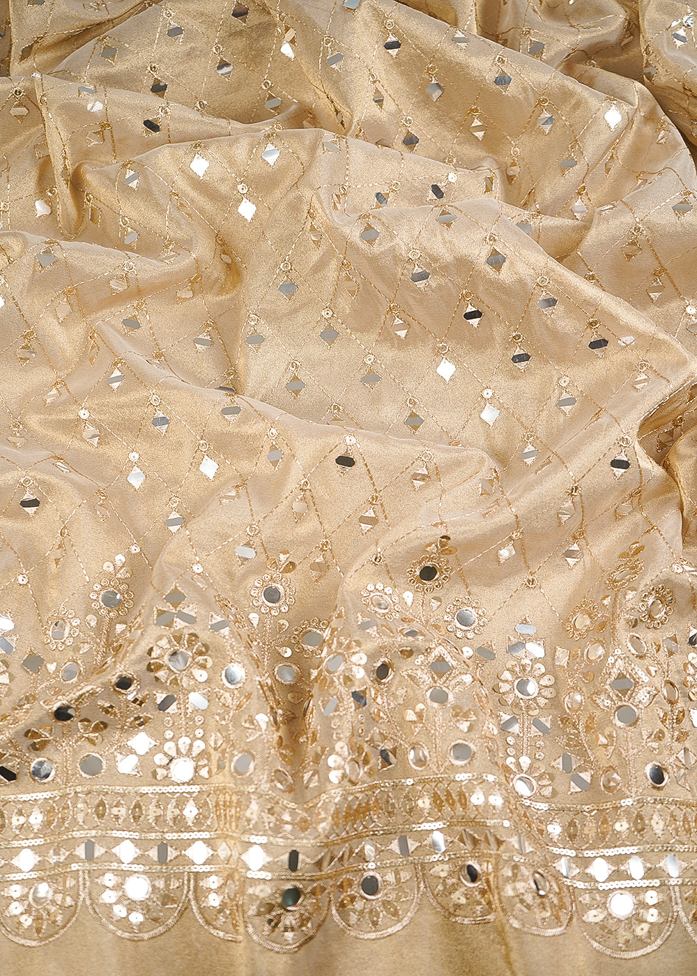 Golden Dyeable Tissue Fabric With All Over Zari, Sequins And Faux Mirror Work With One Side Heavy Border 24629