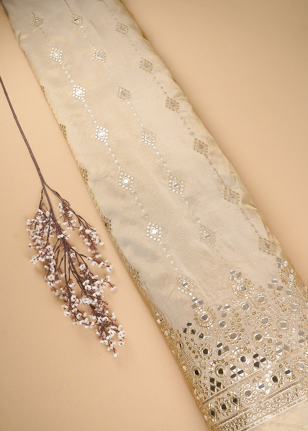 Golden Dyeable Tissue Fabric With All Over Zari, Sequins And Faux Mirror Work With One Side Heavy Border 24631