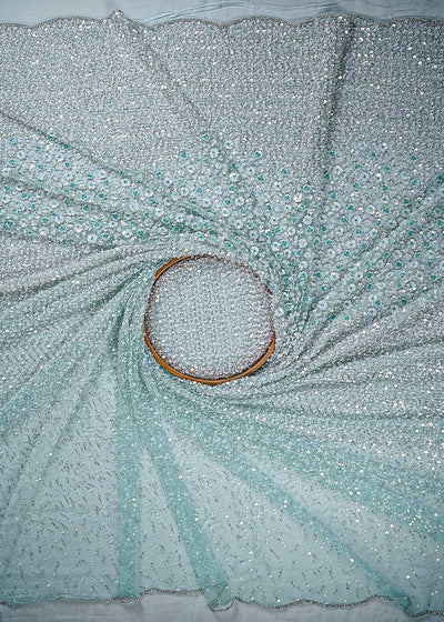 Sky Blue Imported Net Fabric With All Over Sequins, Katdana And Bead Work With One Side Heavy Border 24697