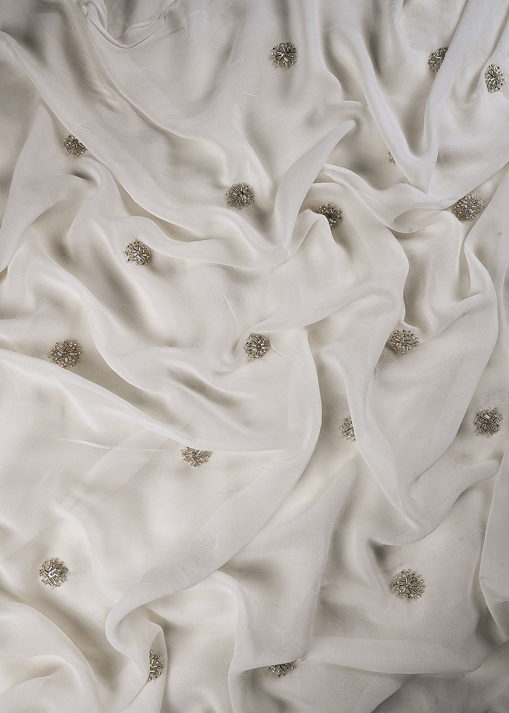 White Dyeable Georgette Fabric With All Over Buti Of Silver Sequins And Katdana Work 25114