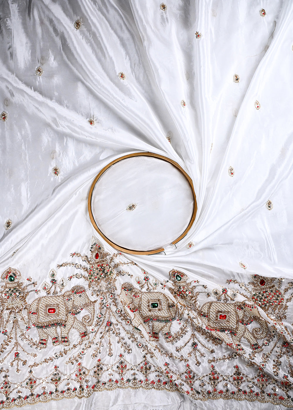 White Dyeable Crepe Fabric With All Over Zari, Sequins, Katdana And Stone Work With One Side Heavy Border 25666