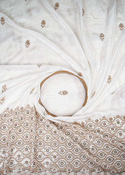 White Dyeable Crepe Fabric With All Over Zari, Sequins And Katdana Work With One Side Heavy Border 25677