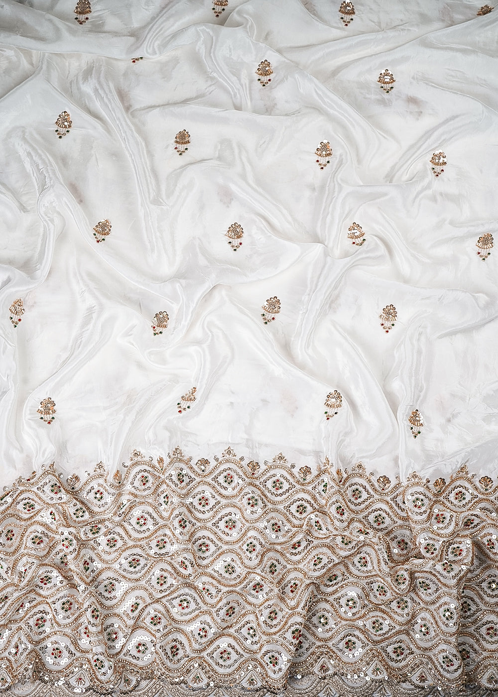 White Dyeable Crepe Fabric With All Over Zari, Sequins And Katdana Work With One Side Heavy Border 25677