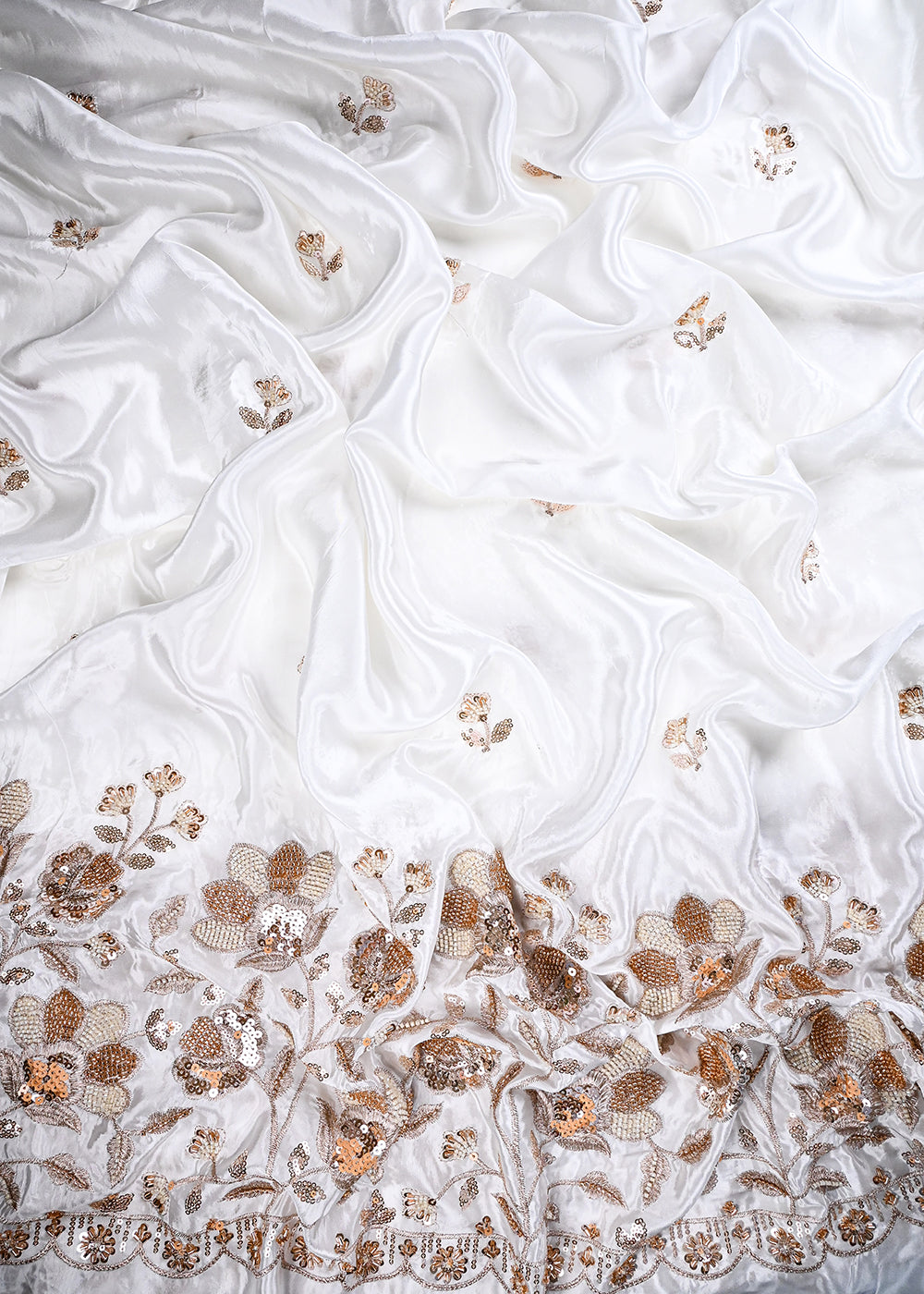 White Dyeable Crepe Fabric With All Over Zari, Sequins And Katdana Work With One Side Heavy Border 27031
