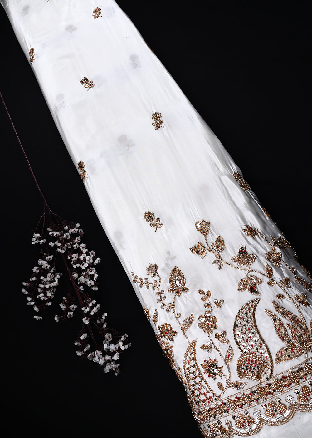 White Dyeable Crepe Fabric With All Over Zari, Sequins And Katdana Work With One Side Heavy Border 27034