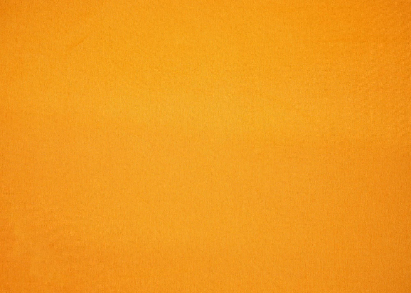 Orange coloured barfi silk fabric