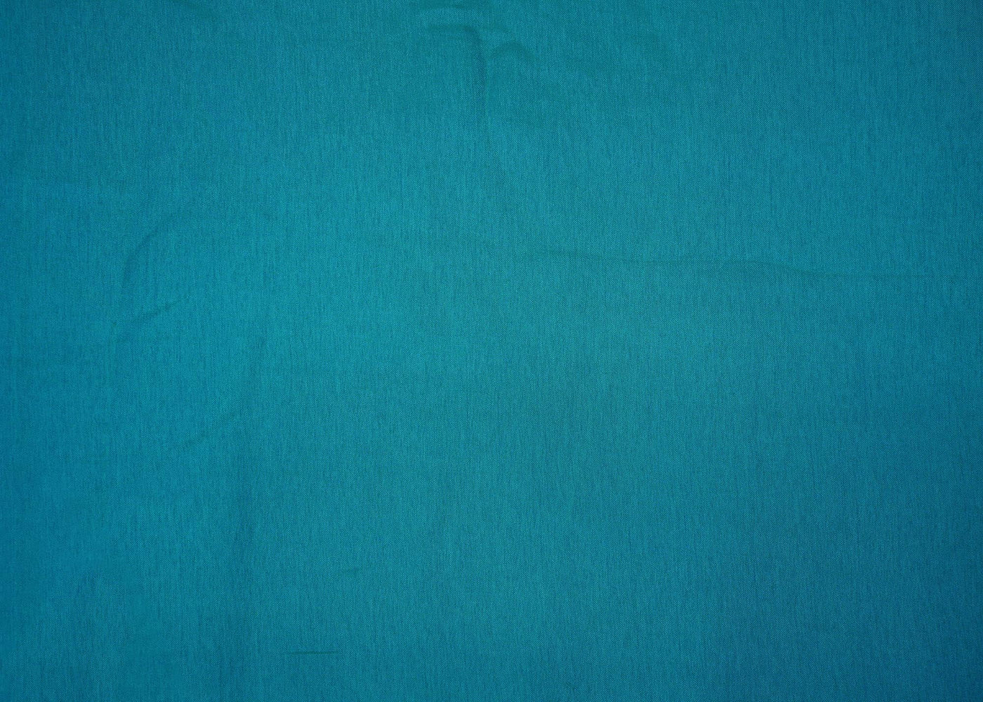 Turquiose coloured barfi silk fabric