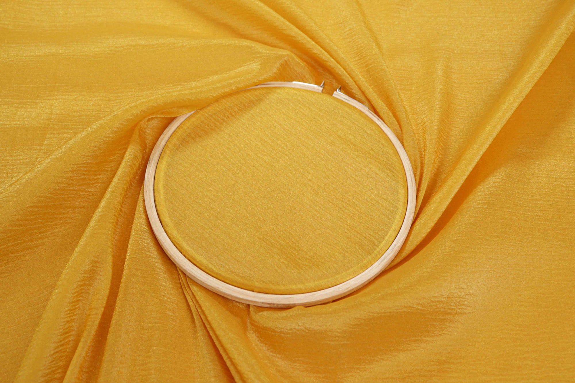 Mustard yellow coloured crushed tissue organza fabric
