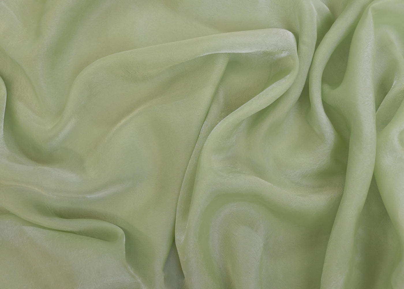 Pista green coloured silk crushed texture fabric