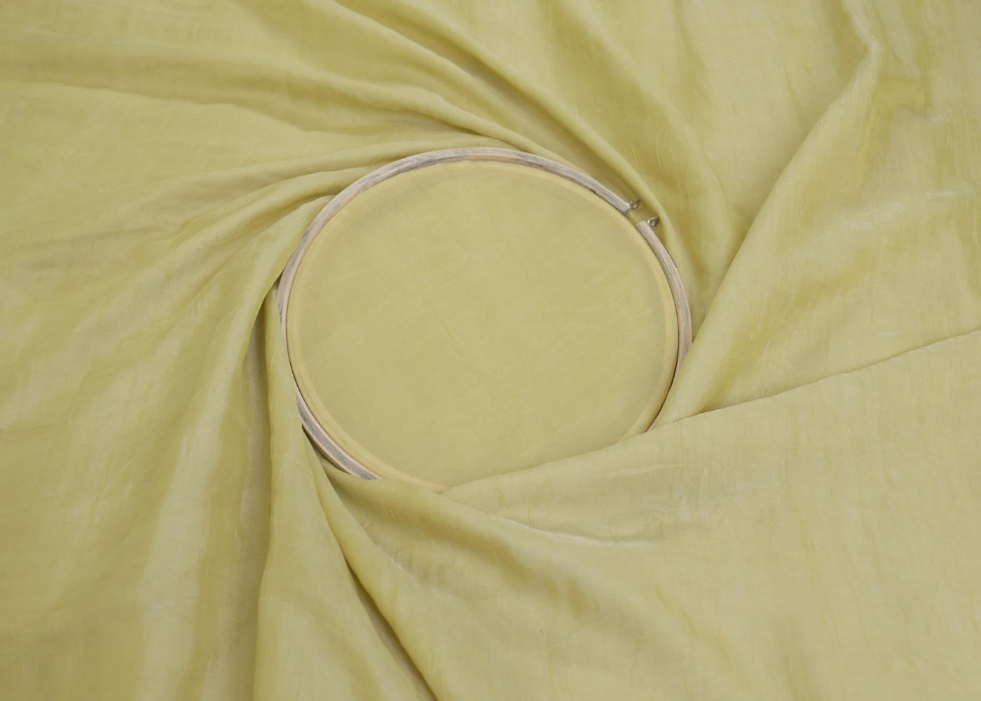 Lemon coloured silk crushed texture fabric - Paras Gallery Fabrics