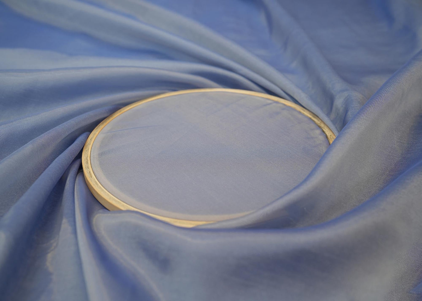 Sky blue coloured soft tissue fabric with shimmer