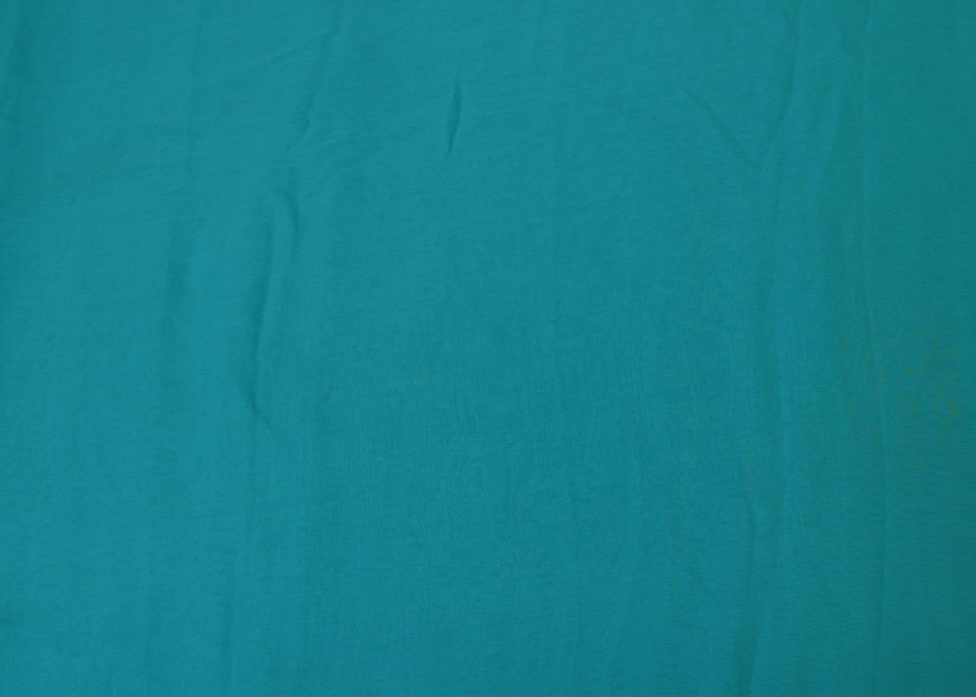 Light rama green plain georgette fabric