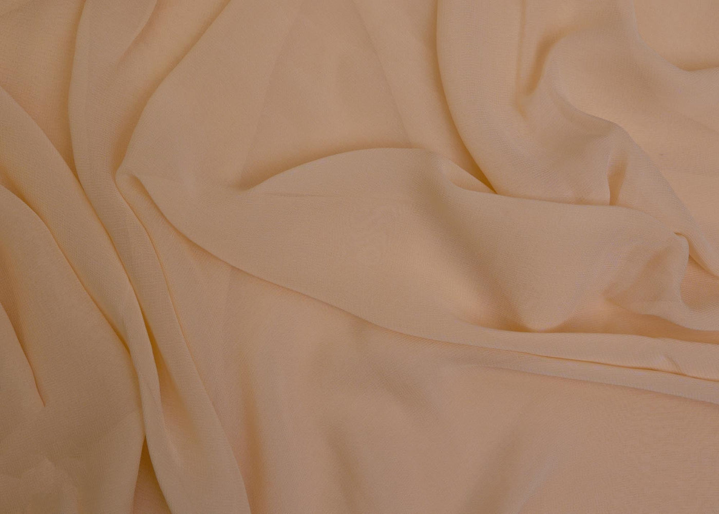 Light peach plain georgette fabric