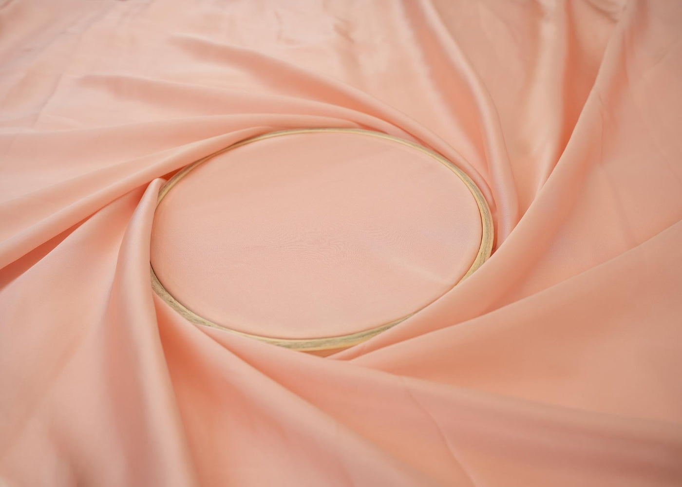 Peach coloured georgette satin