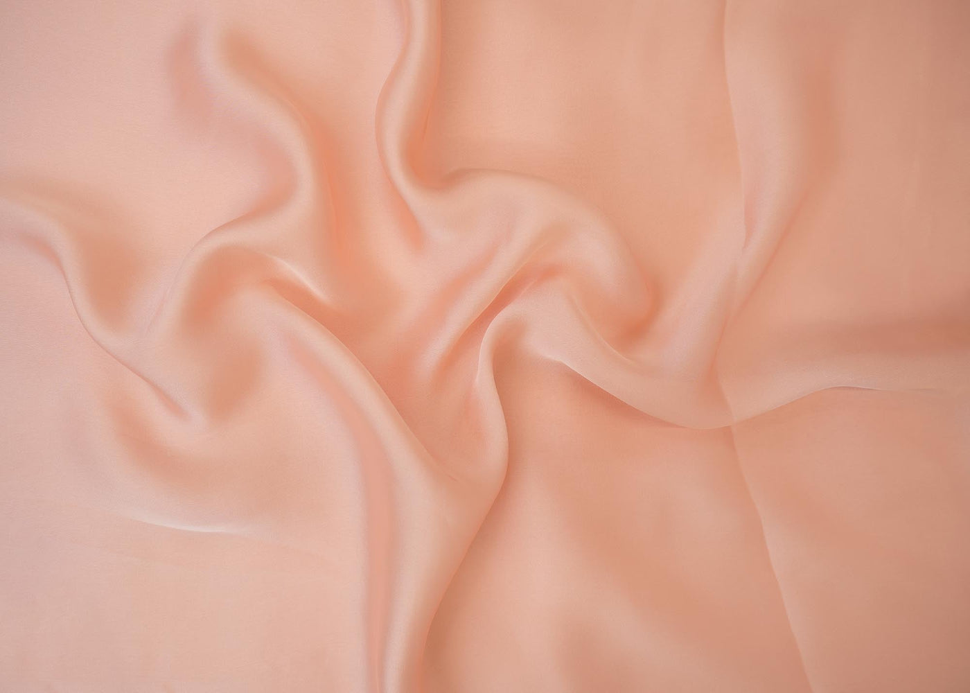 Peach coloured georgette satin