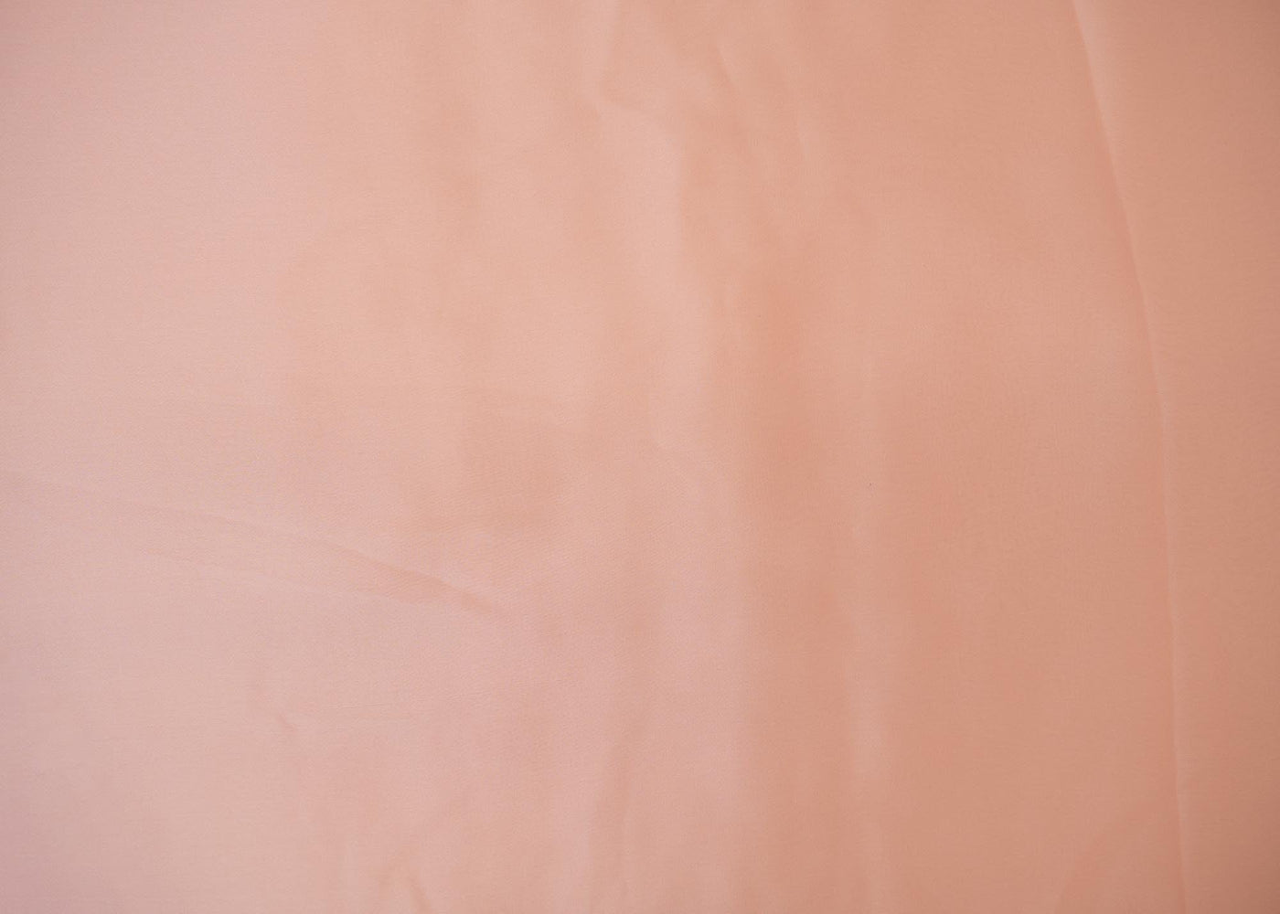 Peach coloured georgette satin