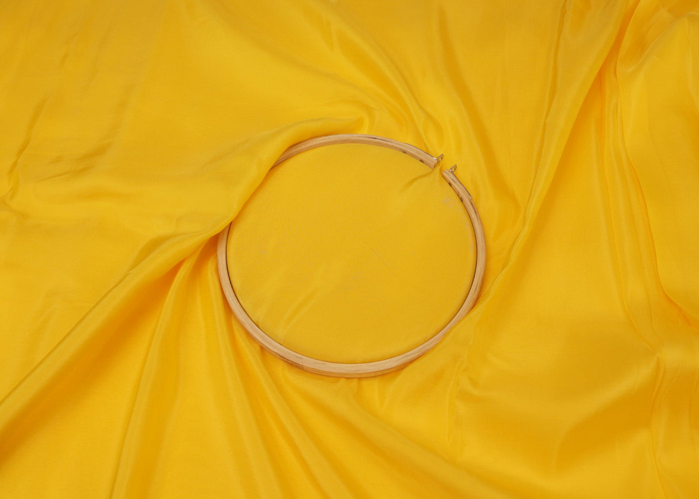 Bright yellow coloured upada silk fabric - Paras Gallery Fabrics