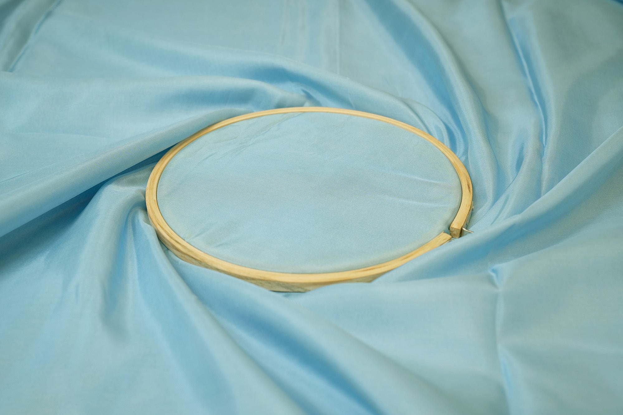 Sky blue coloured upada silk fabric - Paras Gallery Fabrics