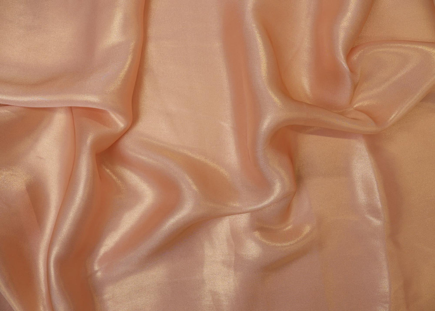Pastel peach coloured shimmer georgette