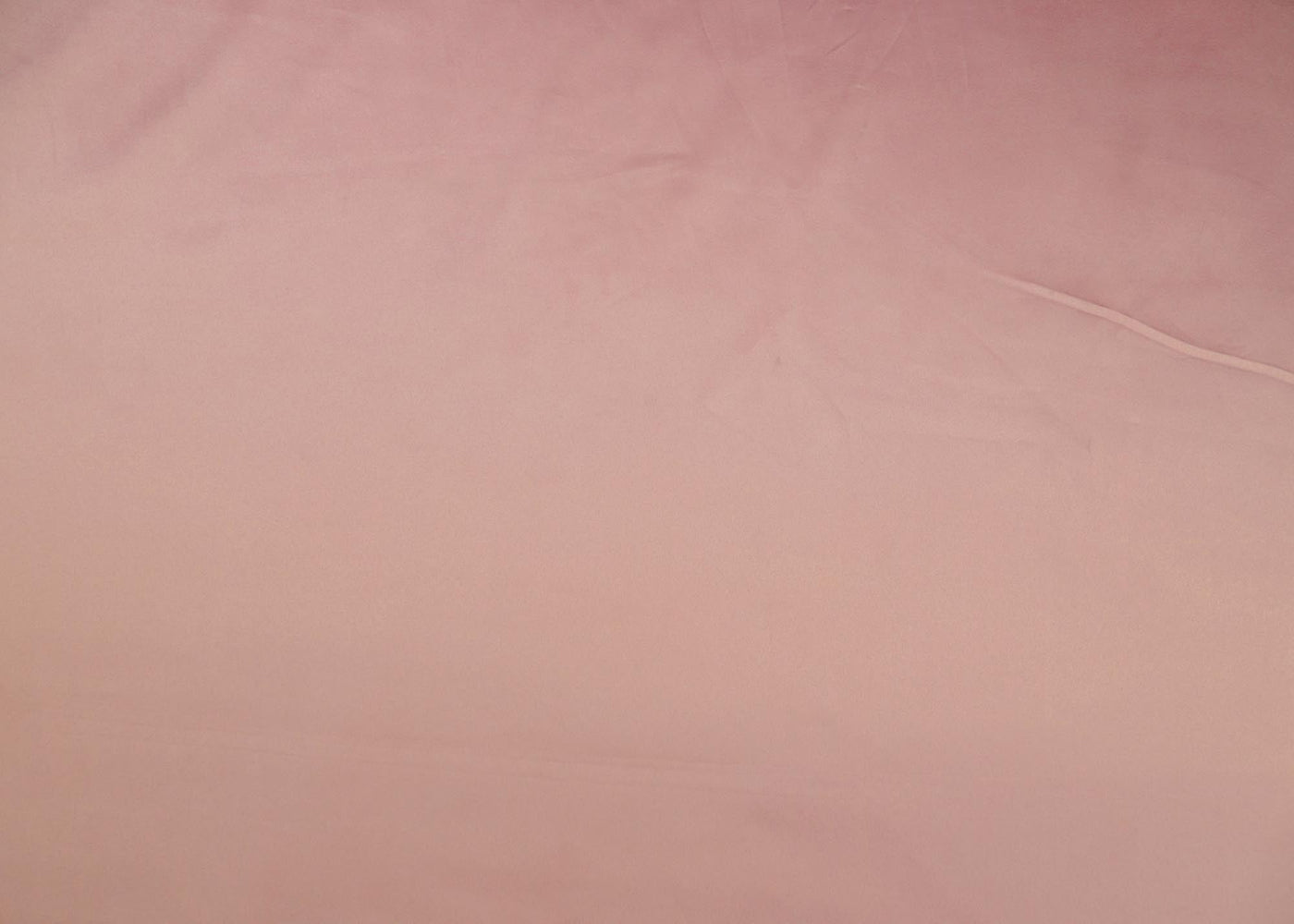 Peach pink colored royal satin