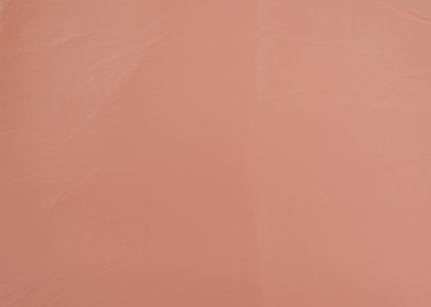 Coral coloured crepe fabric