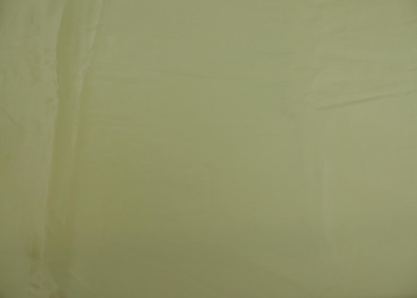 Pista green coloured crepe fabric