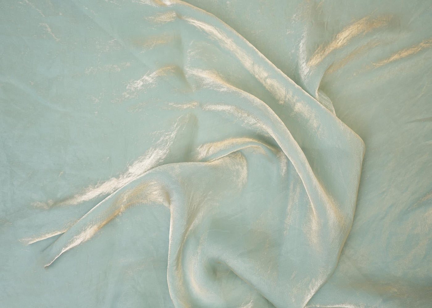 Pastel green coloured diamond tissue fabric