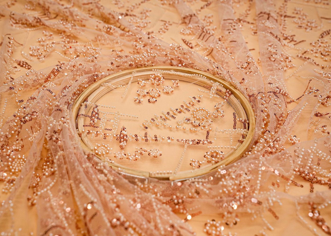 Light Peach Net Adorned with Beads, Pearls, and Sequins