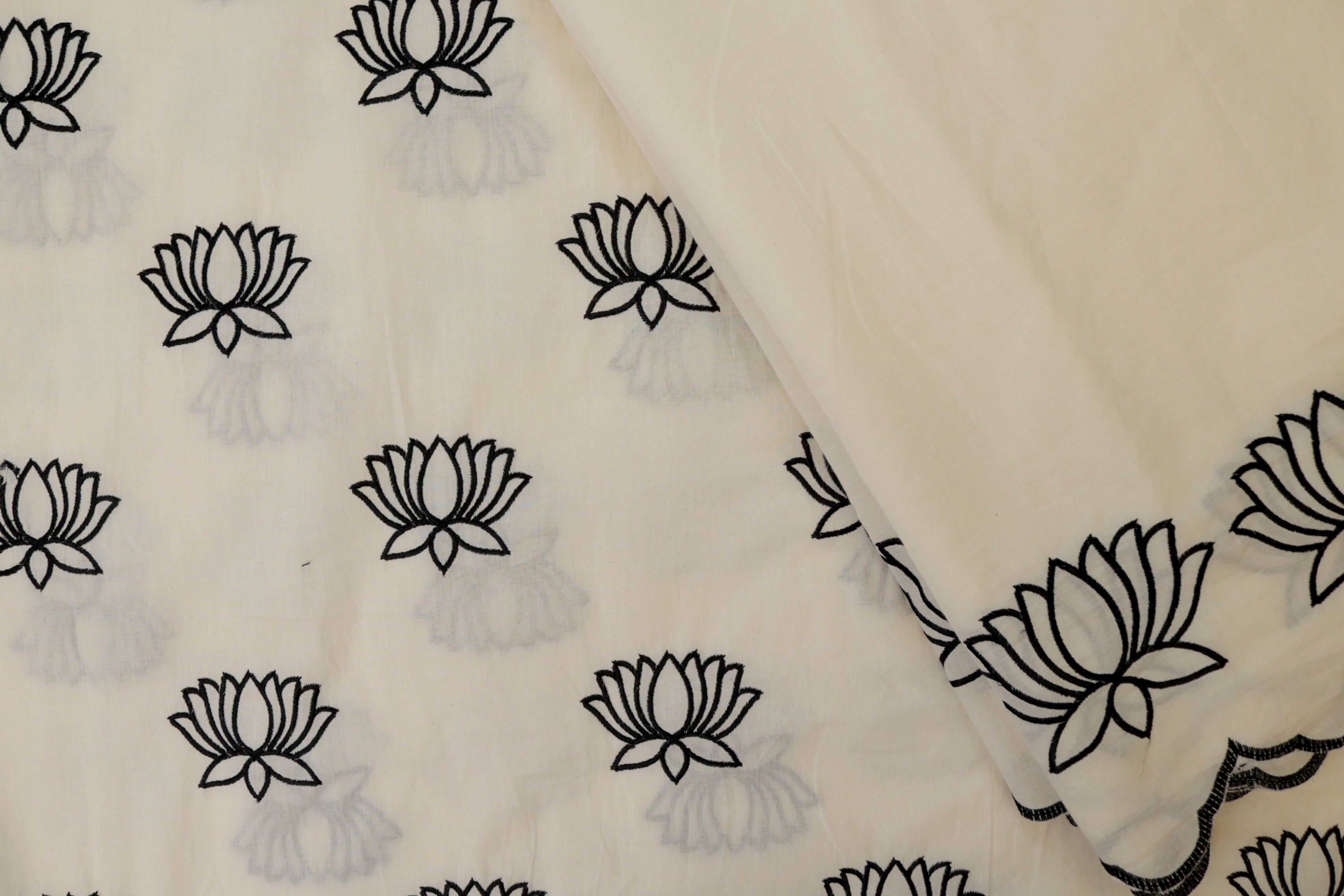 Black Floral patter thread work and cut work on border on cotton fabric