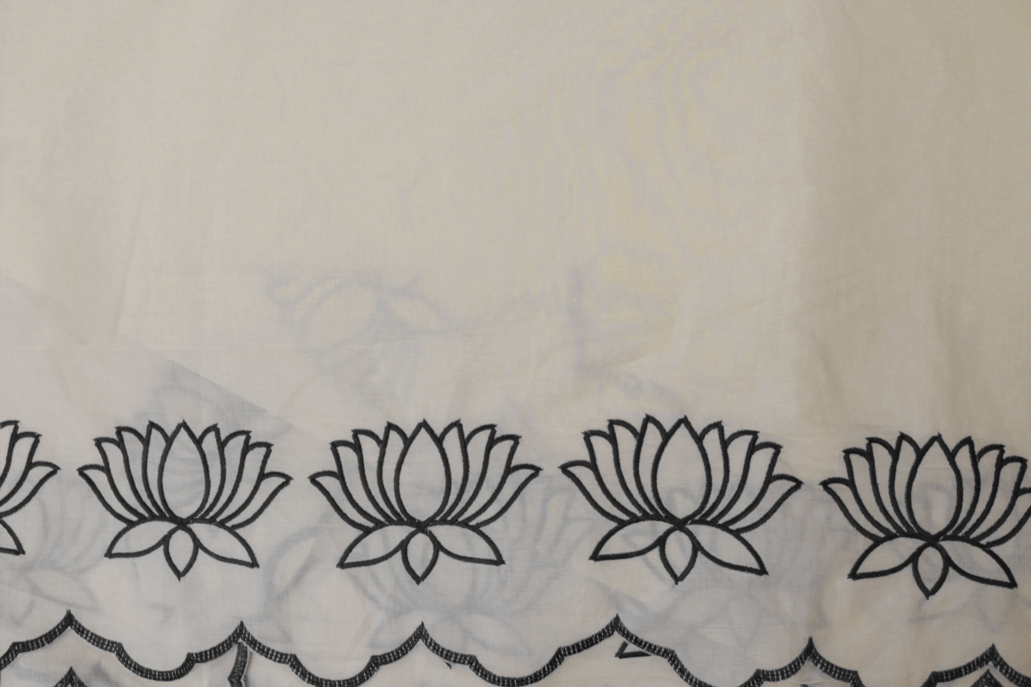 Black Floral patter thread work and cut work on border on cotton fabric