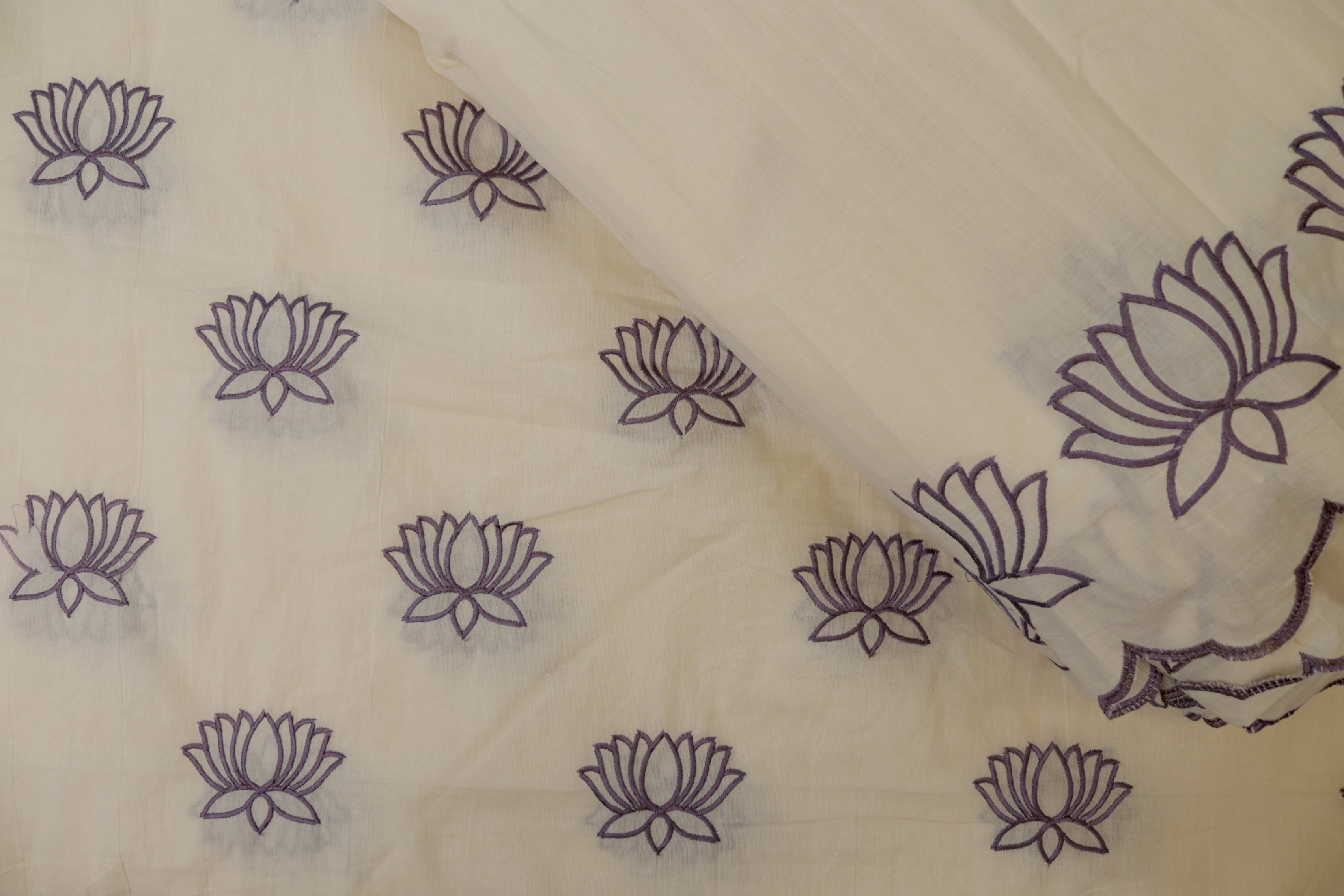 Light voilet Floral patter thread work and cut work on border on cotton fabric