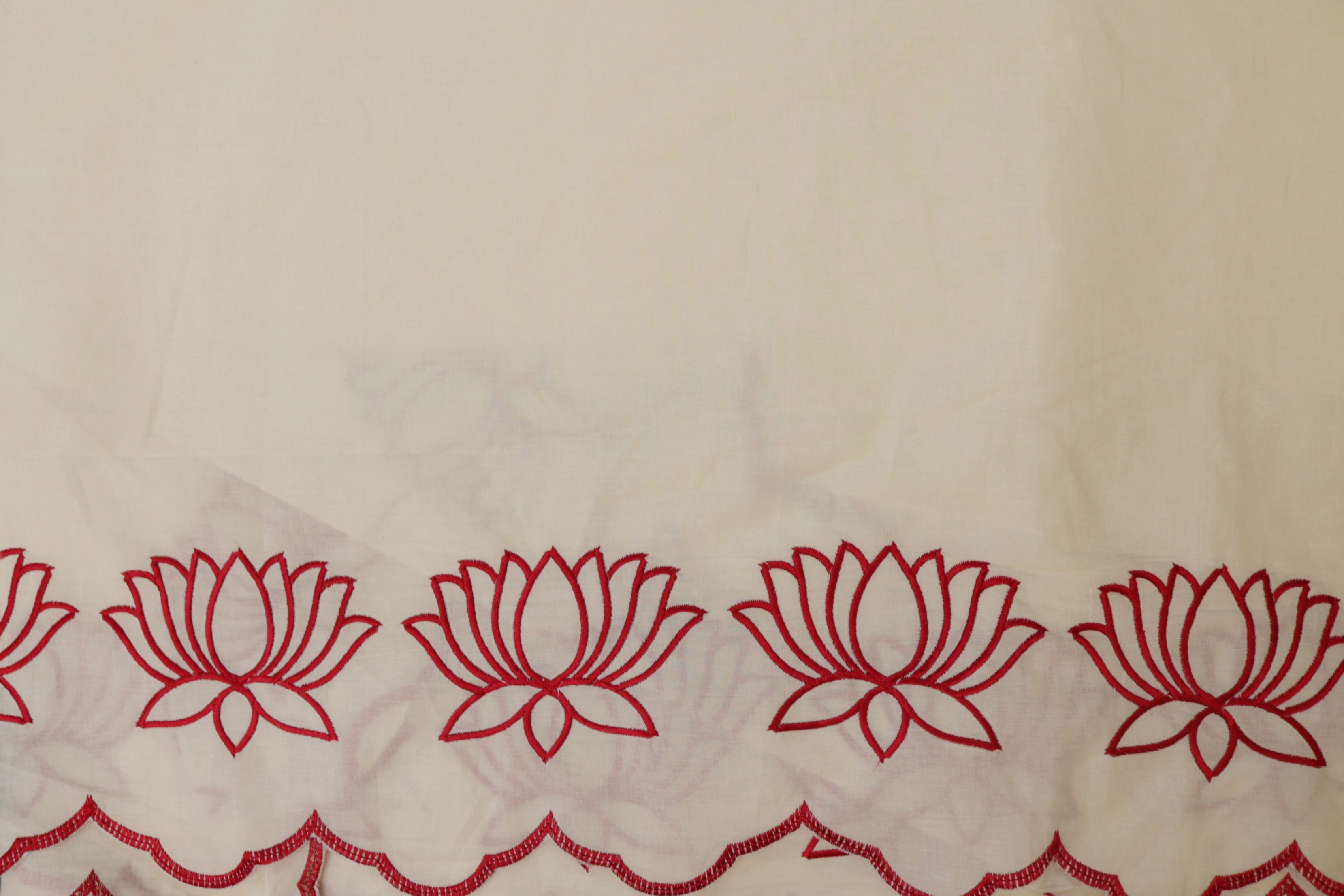 Red Floral patter thread work and cut work on border on cotton fabric