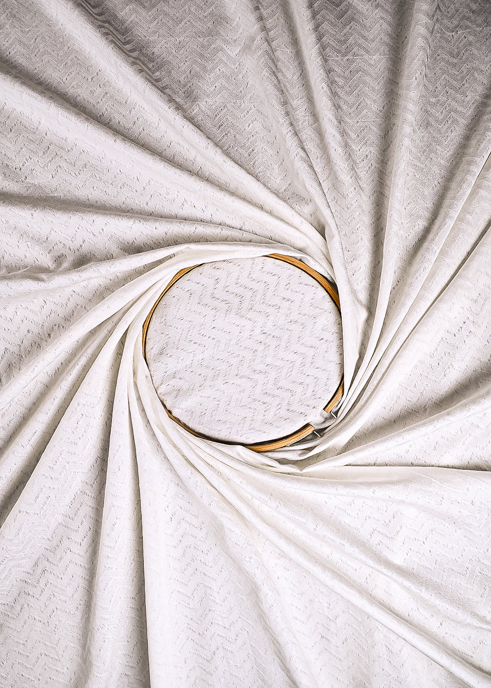 White Dyeable Cotton Fabric With All Over Self Work 10011