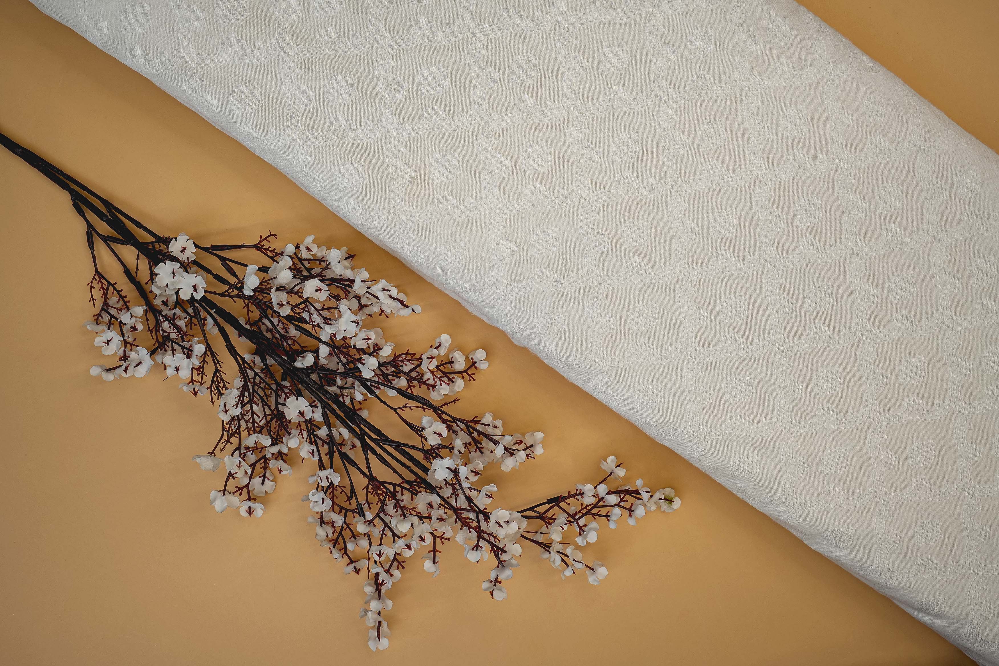 White Dyeable Cotton Fabric With All Over Self Work 10012