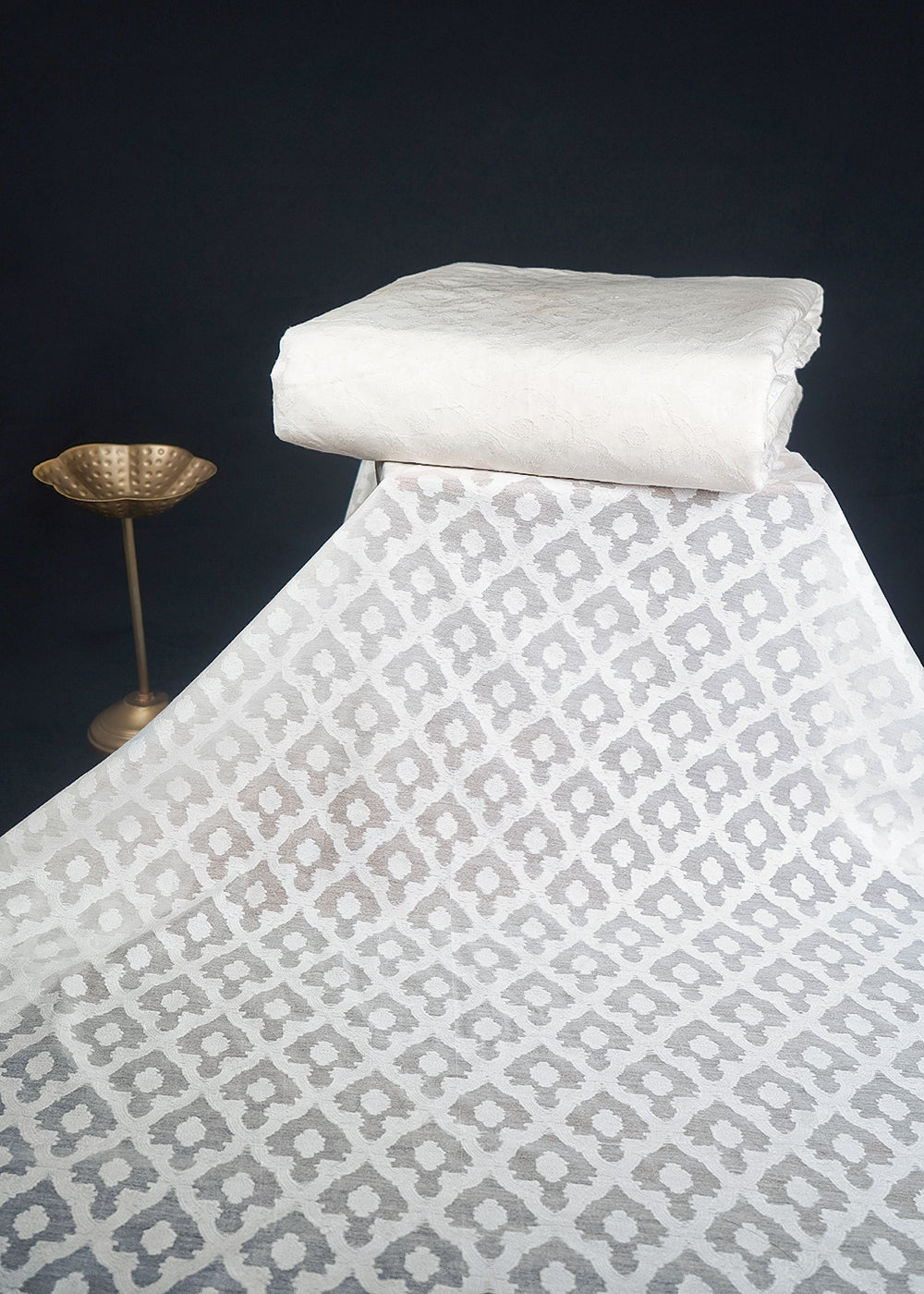 White Dyeable Cotton Fabric With All Over Self Work 10012