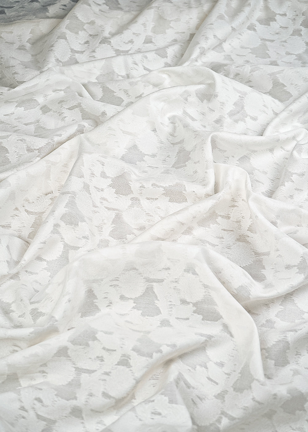 White Dyeable Cotton Fabric With All Over Self Work 10013