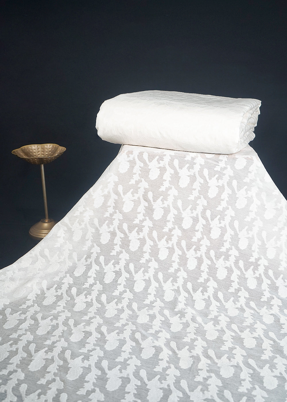 White Dyeable Cotton Fabric With All Over Self Work 10017