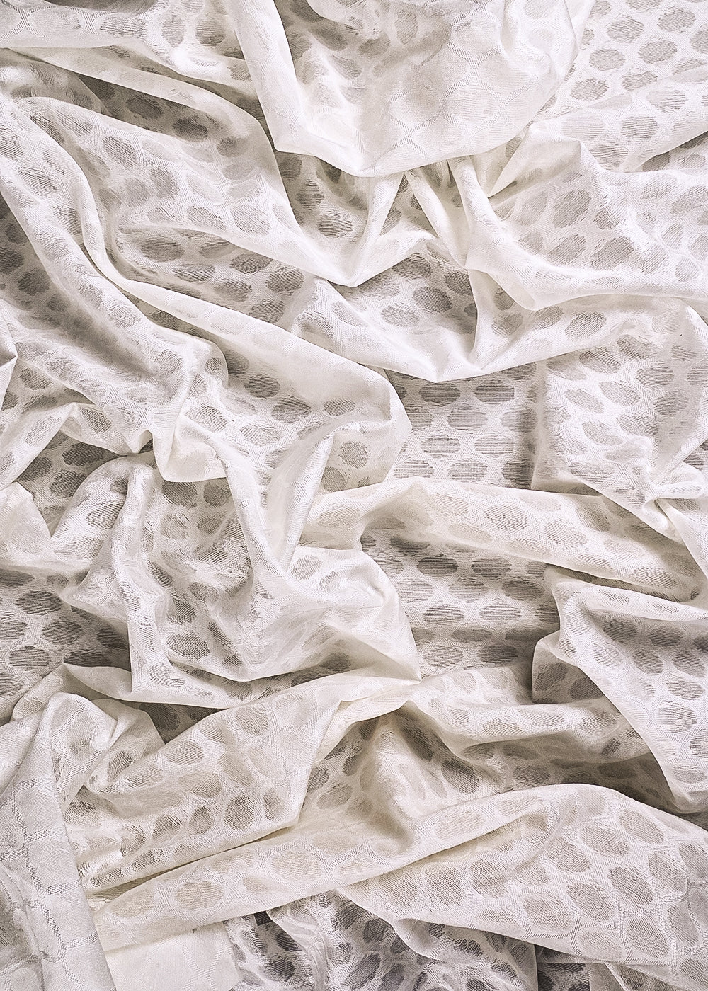 White Dyeable Cotton Fabric With All Over Self Work 10018